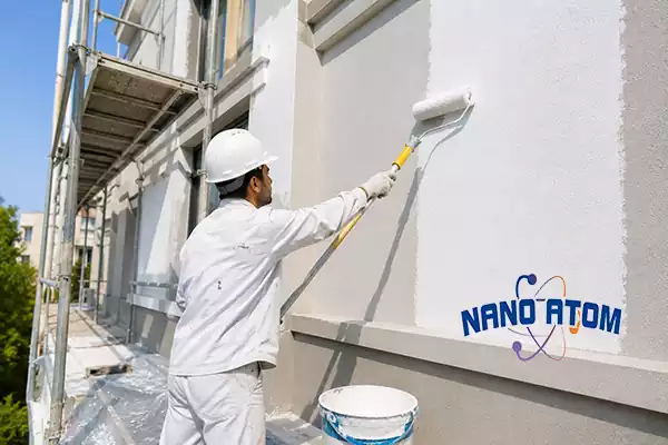 اجرای رنگ نمای ساختمان جوتن با غلتک روی نمای ساختمان
